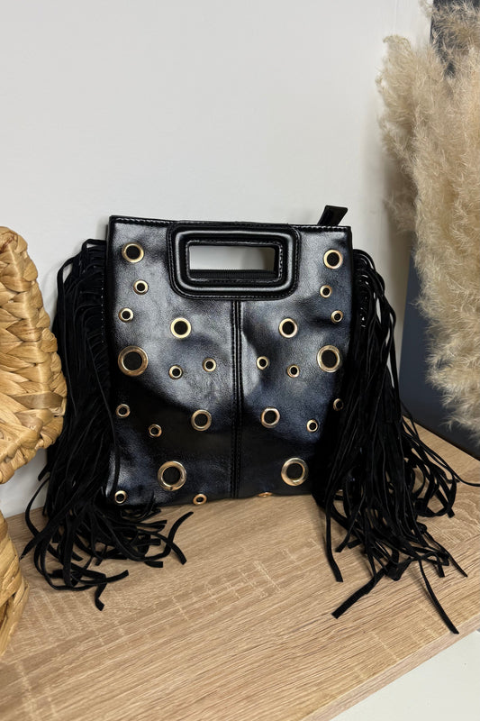 Sac Tendance avec la forme d'un sac de grande marque. details des oeillets et des franges sur le coté 