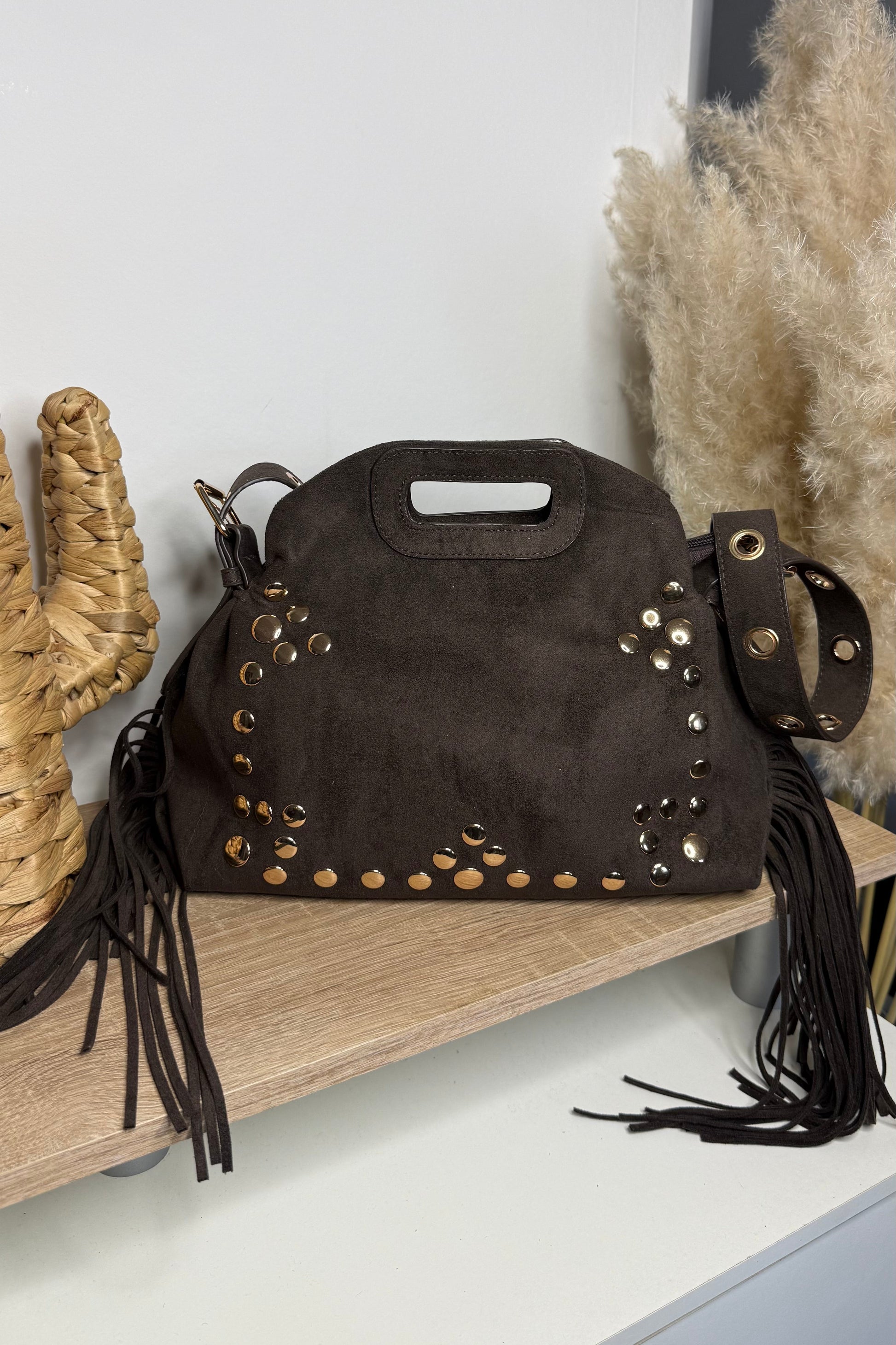 Sac marie chocolat forme de sac d'une grande marque avec ses clou et ses franges