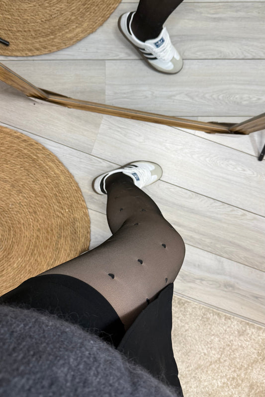 Collants polaire transparent noir avec des détail de coeur 